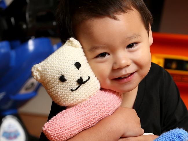 Bodhi received a teddy bear from the firefighters. Picture: Damian Shaw