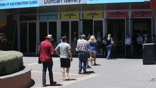 People queue for Covid shots at the vaccination Clinic at Wayville Showgrounds. Picture: Emma Brasier