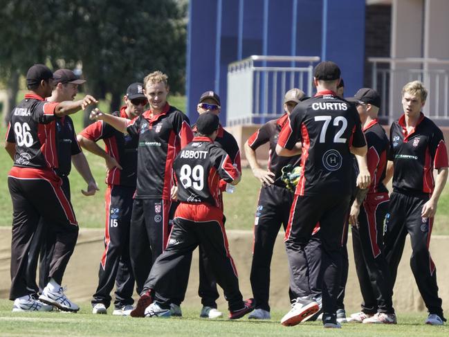 South Caulfield players celebrate a Mordialloc wicket on Saturday. Picture: Valeriu Campan