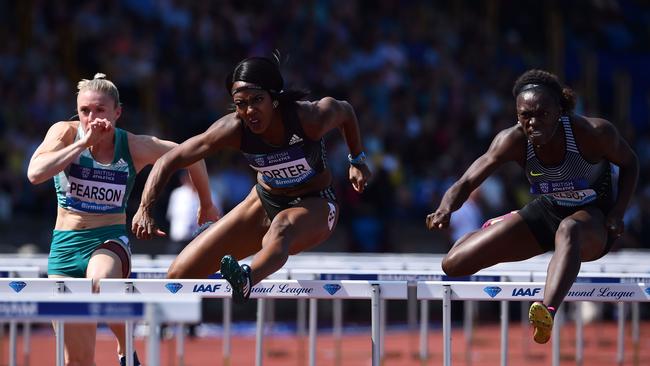 Australia's Sally Pearson, Britain’s Tiffany Porter, centre, and US athlete Dawn Harper-Nelson