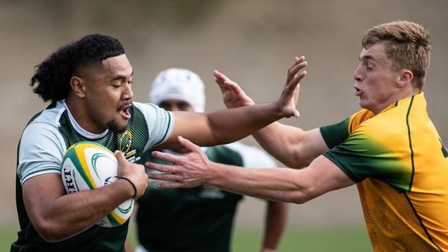 Barbarians Sosaia Kaufusi palms off a challenge. Picture: Julian Andrews