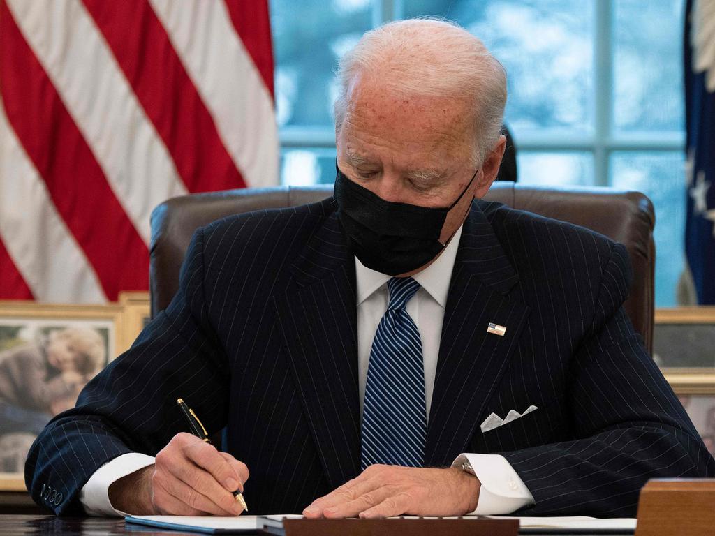 US President Joe Biden signs another Executive Order. Action on climate change will be a priority area for the new administration. Picture: Jim Watson/AFP