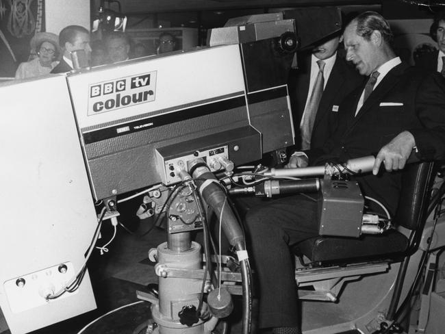 Prince Philip tries his hand as a television cameraman at the BBC studios in 1972. Picture: Getty Images