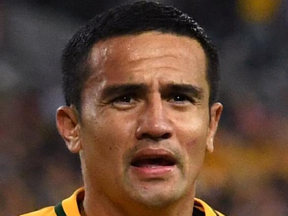 (FILES) This file photo taken on October 10, 2017 shows Tim Cahill of Australia (C) celebrating with teammates after scoring against Syria during their 2018 World Cup football qualifying match against Syria played in Sydney. Veteran goal-scorer Tim Cahill remains indispensable as Australia head into their World Cup playoff with Honduras -- even when he's injured, and rapidly approaching his 38th birthday. / AFP PHOTO / WILLIAM WEST / -- IMAGE RESTRICTED TO EDITORIAL USE - STRICTLY NO COMMERCIAL USE --