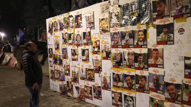 A board in Tel Aviv displaying pictures of hostages taken from Israel by Palestinian militants. Picture: AFP