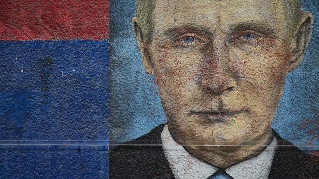 A mural of Russian president Vladimir Putin, who has entered the end times of his rule according to Greg Sheridan. Picture: Getty Images