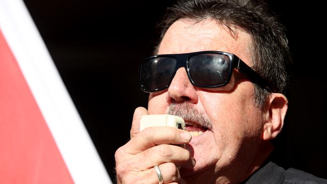 EDUCATED LOT: Australian Education Union (AEU) President Howard Spreadbury speaks to members during a rally outside the Department of Education (AAP Image/Kelly Barnes)