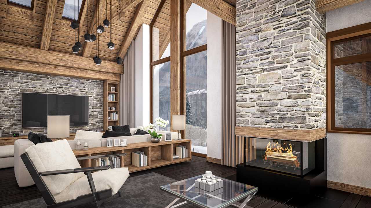 A contemporary interior and fireplace that takes advantage of skylights and big windows. Picture: Korisbo