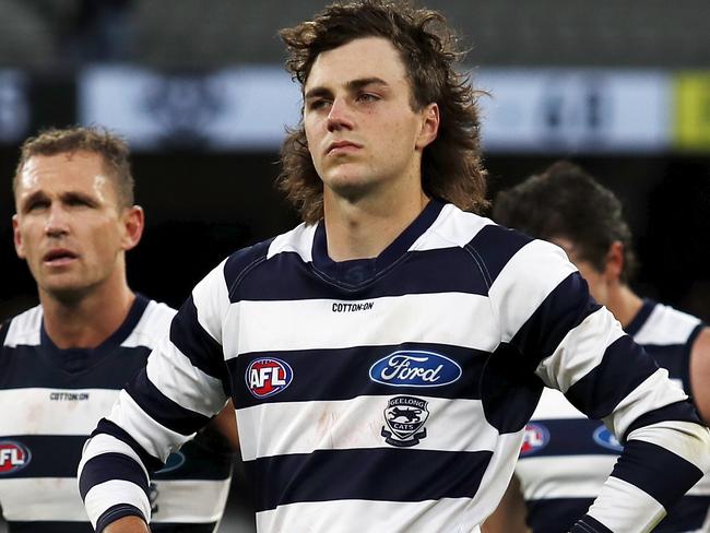 MELBOURNE, AUSTRALIA - APRIL 11: Jordan Clark of the Cats reacts after a loss during the 2021 AFL Round 04 match between the Melbourne Demons and the Geelong Cats at the Melbourne Cricket Ground on April 11, 2021 in Melbourne, Australia. (Photo by Dylan Burns/AFL Photos via Getty Images)