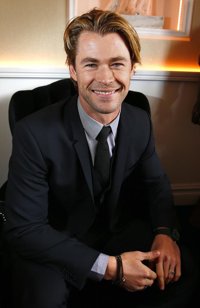 Hunk of gorgeousness: Chris Hemsworth in the Birdcage on Derby Day for Johnnie Walker. Picture: Bradley Hunter