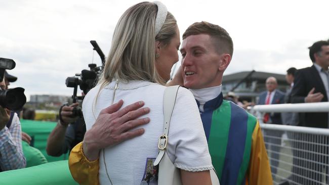 Chad Schofield celebrates with his wife after riding Ceolwulf to victory in the Group 1 Epsom Handicap. Picture: Jeremy Ng / Getty Images