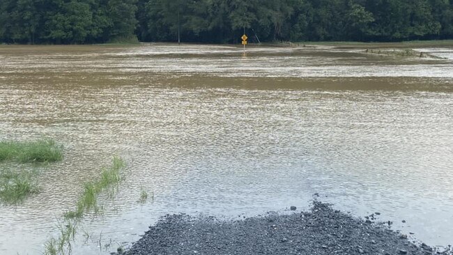 Floodwaters cover a road in Stewart Creek Valley, just south of Daintree. Picture: Facebook