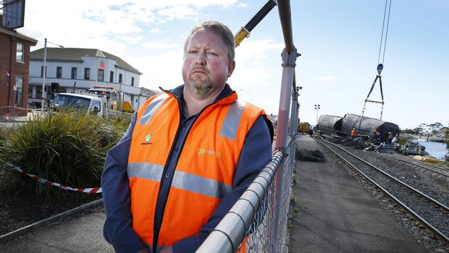 TasRail chief executive officer Steven Dietrich – seen here at the scene of a train derailment in Devonport in 2018 – was one of several top public servants to have their pay drop in 2019-20. Picture: CHRIS KIDD