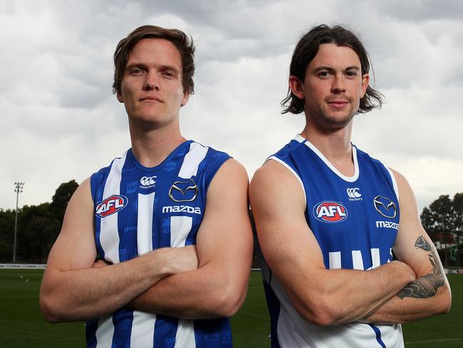 MELBOURNE, AUSTRALIA - NOVEMBER 20: Jared Polec (L) and Jasper Pittard of the Kangaroos pose during a North Melbourne Kangaroos AFL media opportunity at Arden Street Ground on November 20, 2018 in Melbourne, Australia. (Photo by Graham Denholm/Getty Images)