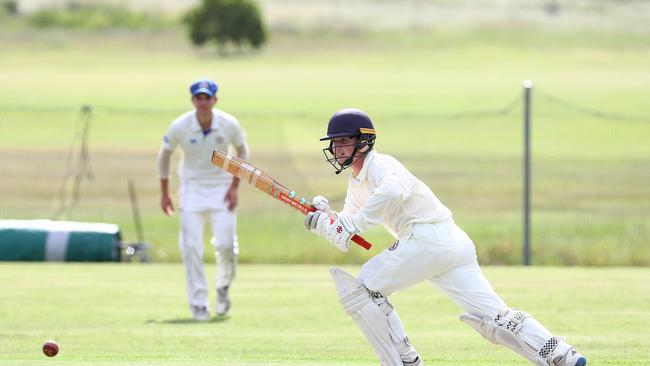 Action from the match between Brisbane State High School and Nudgee College. NC's Joshua Martin bats. Picture: Tertius Pickard