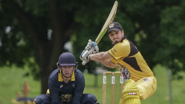 Balwyn wicketkeeper Thomas Gill and Werribee batter Tim O'Brien both have eyes for the ball. Picture: Valeriu Campan