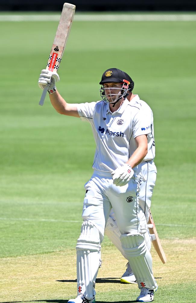 Cameron Green celebrates 50 at the Gabba. He was eventually dismissed for 96. Picture: Bradley Kanaris/Getty Images