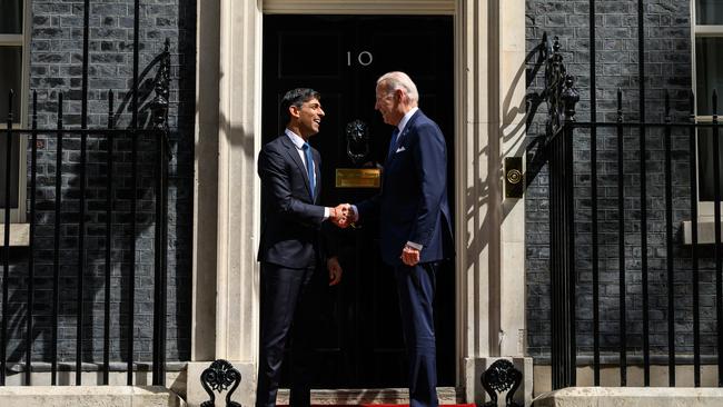 Britain's Prime Minister Rishi Sunak (L) greets US president Joe Biden on the doorstep of 10 Downing Street ahead of a bi-lateral meeting. Picture: Leon Neal/Getty Images