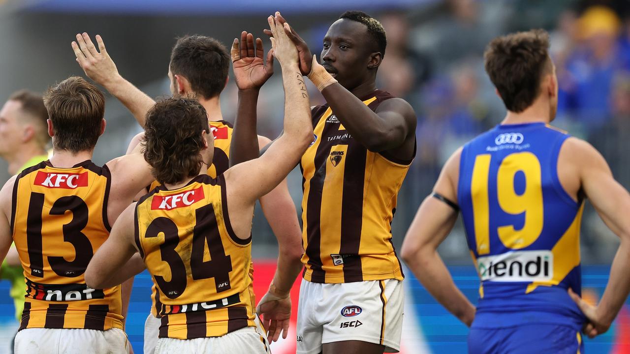 PERTH, AUSTRALIA - JUNE 30: Mabior Chol of the Hawks celebrates after scoring a goal during the 2024 AFL Round 16 match between the West Coast Eagles and the Hawthorn Hawks at Optus Stadium on June 30, 2024 in Perth, Australia. (Photo by Will Russell/AFL Photos via Getty Images)