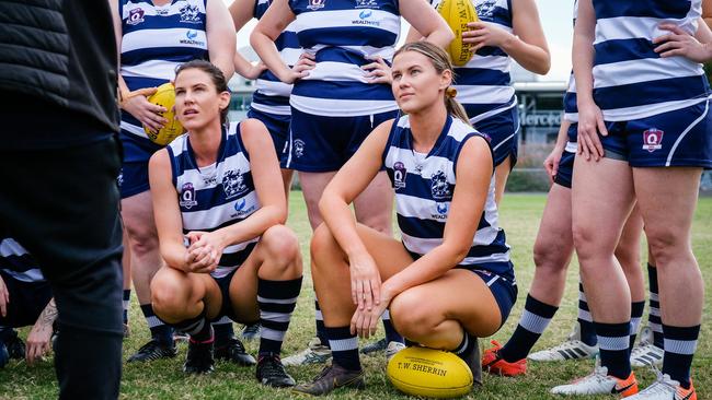 Broadbeach Cats co-captains Rebecca Goodwin (left) and Holly Thompson (right) achieved their 50 game milestones in back to back QFAW Division One victories. Pic: Brooke Sleep.