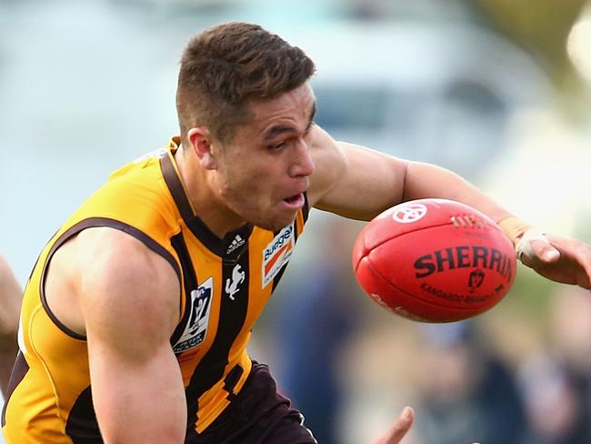 MELBOURNE, AUSTRALIA - SEPTEMBER 05: Shem Tatupu of the Hawks gathers the ball during the VFL Qualifying Final match between the Box Hill Hawks and Footscray Bulldogs at Box Hill City Oval on September 5, 2015 in Melbourne, Australia. (Photo by Robert Prezioso/AFL Media/Getty Images)