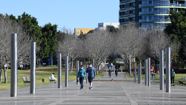 Sydneysiders exercise at Bicentennial Park in Homebush during lockdown on Thursday. Photo: James D. Morgan/Getty Images