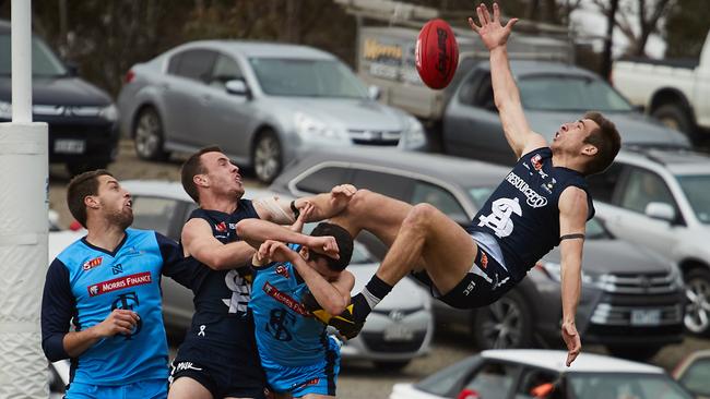 South Adelaide star Joel Cross shows off his party tricks against Sturt. Picture: Matt Loxton/AAP