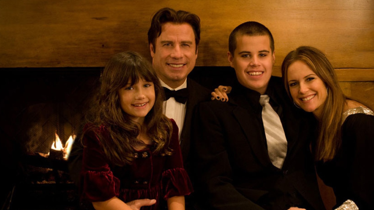 Travolta poses with his daughter Ella Bleu (L) and wife Kelly Preston and son Jett in an undated family photo.