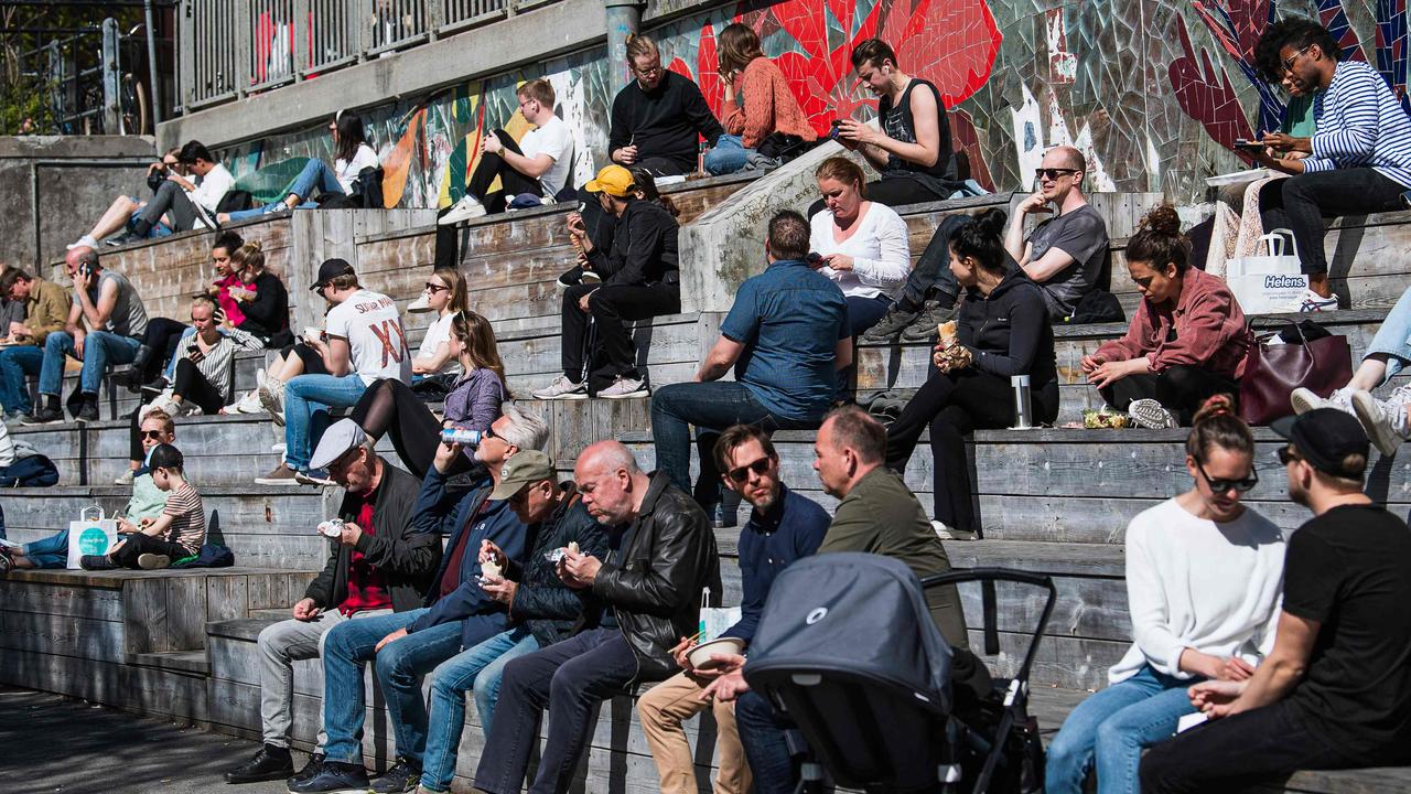 People enjoy the warm spring weather at Hornstull in Stockholm. Picture: AFP
