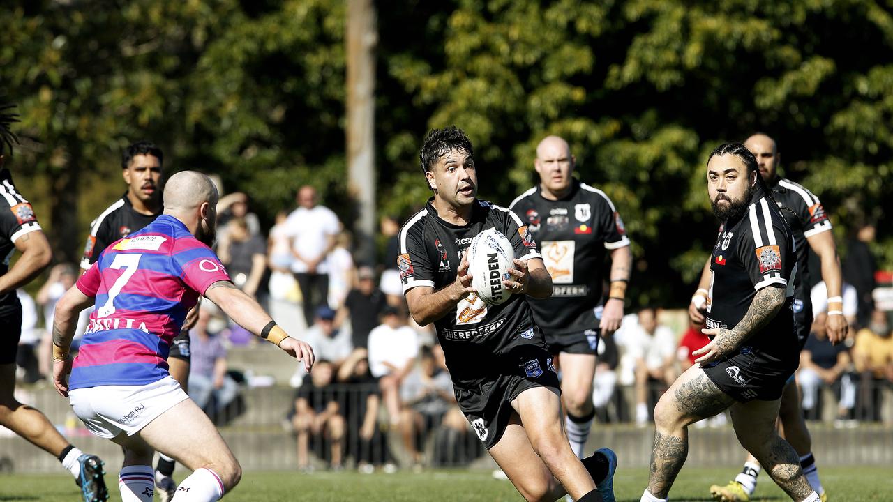 Redfern's Djawinj Gordon with the ball. Picture: John Appleyard