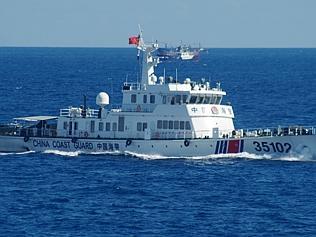 Chinese fleet swarms near East China Sea islands