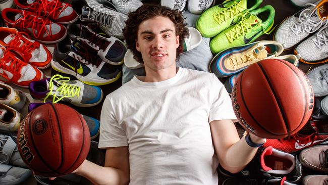 Josh Giddey at home with some of his shoe collection. Picture Matt Turner.