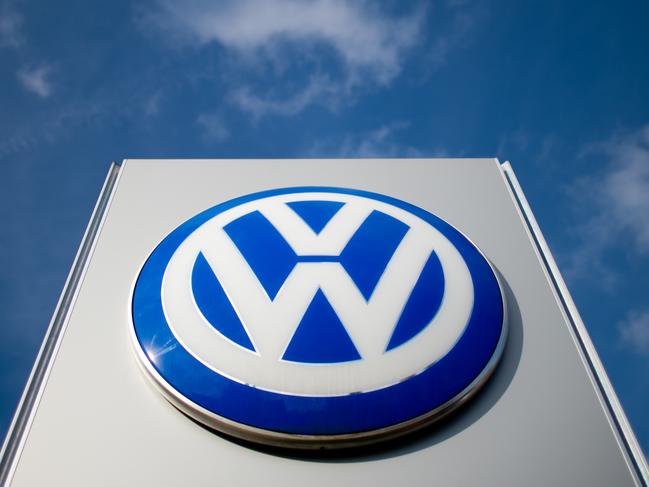 (FILES) This file photo taken on February 20, 2014 shows the German car maker Volkswagen logo displayed at a car dealer in Hanover. - German prosecutors searched car giant Volkswagen's offices on December 3, 2019 over the long-running "dieselgate" emissions cheating scandal, the company said, adding it was cooperating with authorities. (Photo by Julian Stratenschulte / dpa / AFP) / Germany OUT