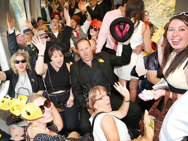 Racegoers return to the city after Melbourne Cup Day 2014 at Flemington Racecourse. Picture: Nathan Dyer