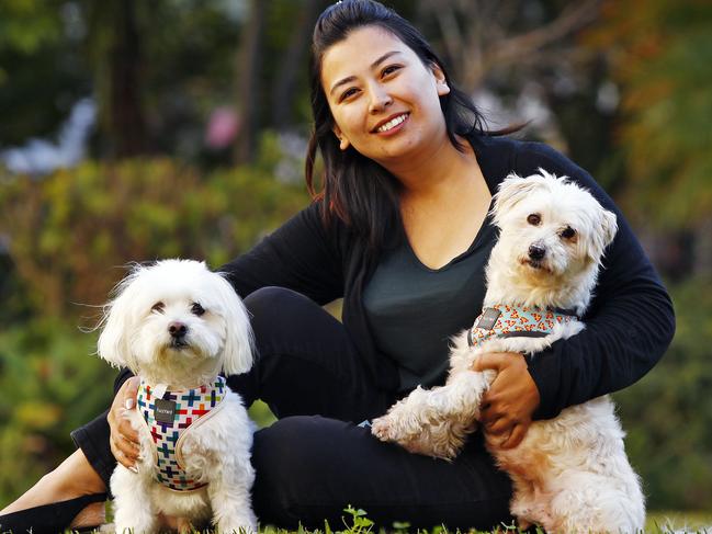 WEEKEND TELEGRAPHS - 9/6/22MUST CLEAR WITH PIC EDITOR ROHAN KELLY BEFORE PUBLISHING - Sneha Shakya. (correct spelling) with dogs Arty and Lucky her adopted dogs at Wolli Creek today. Picture: Sam Ruttyn