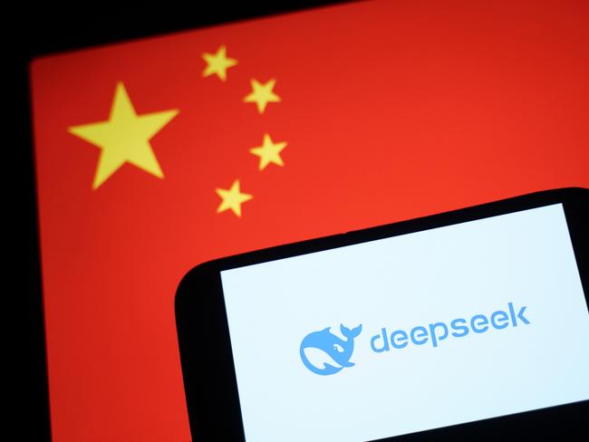 HONG KONG, CHINA - JANUARY 28: In this photo illustration, the DeepSeek logo is seen on a phone in front of a flag of China on January 28, 2025 in Hong Kong, China. Global tech stocks have plummeted following the emergence of DeepSeek, a Chinese AI startup that has developed a competitive AI model at a fraction of the cost of its US rivals, sparking concerns about the high valuations of tech giants like Nvidia. This development has led to significant declines in tech shares across Asia and Europe, with markets in both regions experiencing notable losses as investors reassess the AI landscape and its potential impact on the industry's future. (Photo illustration by Anthony Kwan/Getty Images)