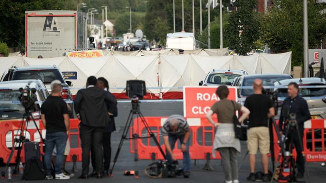 The media gather near the scene of the attack. Picture: Getty Images.