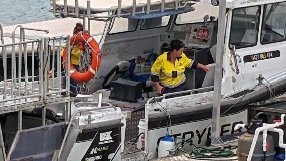 Workplace Health and Safety Queensland investigators are inspecting a fishing charter boat where three crew members were injured after an explosion at Coral Sea Marina on May 9, 2024. Picture: Estelle Sanchez