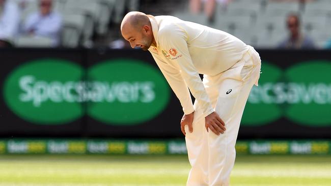 Australia's Nathan Lyon churned through 61 overs of his own. Picture: AFP