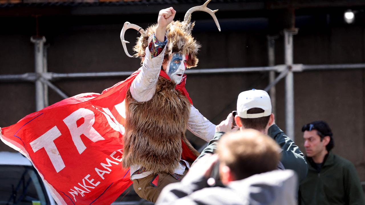 Trump supports gather outside Manhattan Criminal Court as a grand jury is expected to vote this week on whether to indict Mr Trump. Picture: Scott Olson/Getty Images via AFP