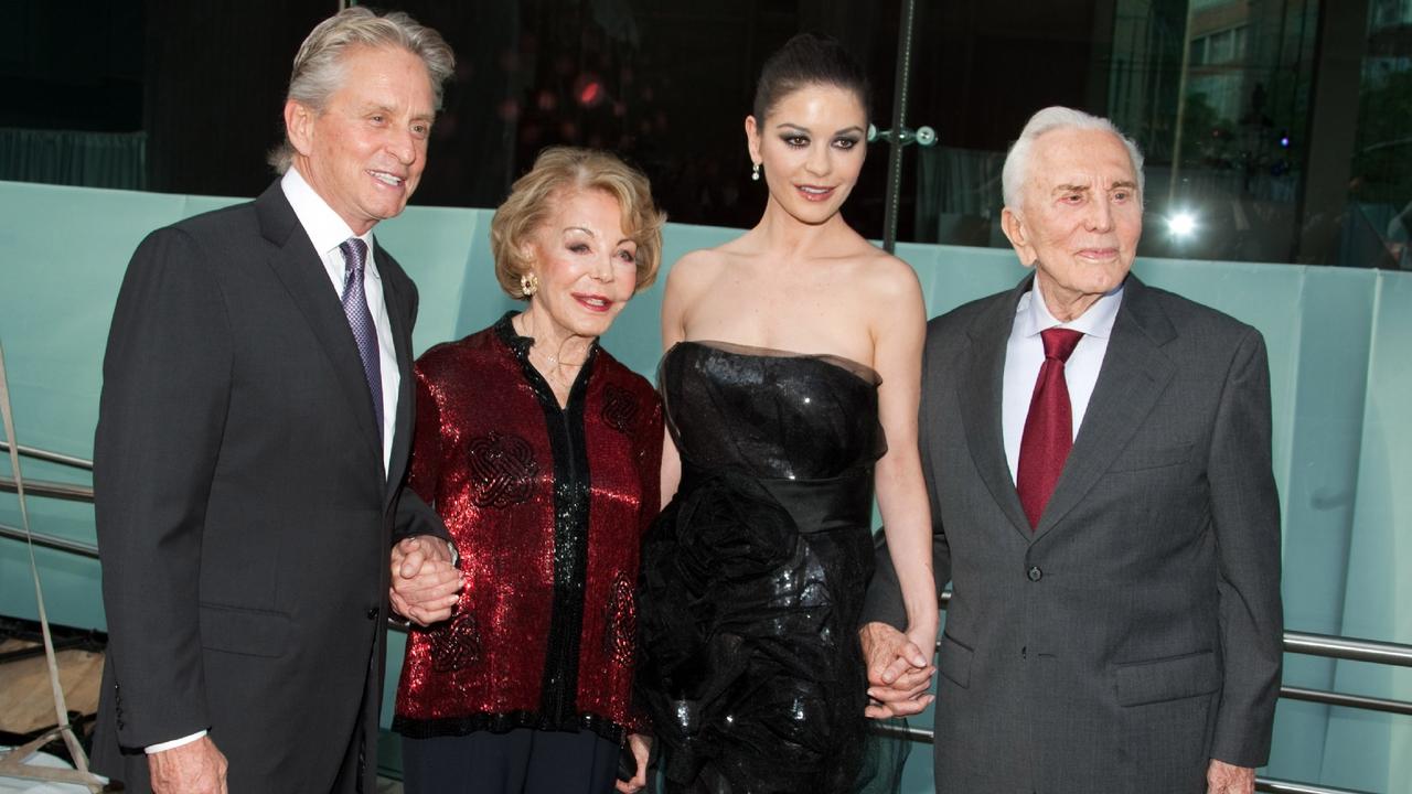 Members of the Douglas family attend an Award Gala honoring Michael Douglas in New York in 2010. L-R: Michael Douglas, Kirk’s wife Anne Buydens, Michael’s wife Catherine Zeta-Jones, and Kirk Douglas. Picture: AP