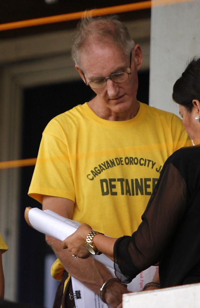 Peter Scully of Australia, accused of raping and trafficking two girls in the Philippines, arrives at a court for his arraignment n 2015. Picture: AFP