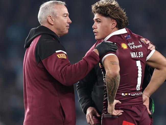 SYDNEY, AUSTRALIA - JUNE 05:  Reece Walsh of the Maroons is attended to by medical staff after been tackled by Joseph-Aukuso Sua'ali'i of the Blues during game one of the 2024 Men's State of Origin Series between New South Wales Blues and Queensland Maroons at Accor Stadium on June 05, 2024 in Sydney, Australia. (Photo by Cameron Spencer/Getty Images)