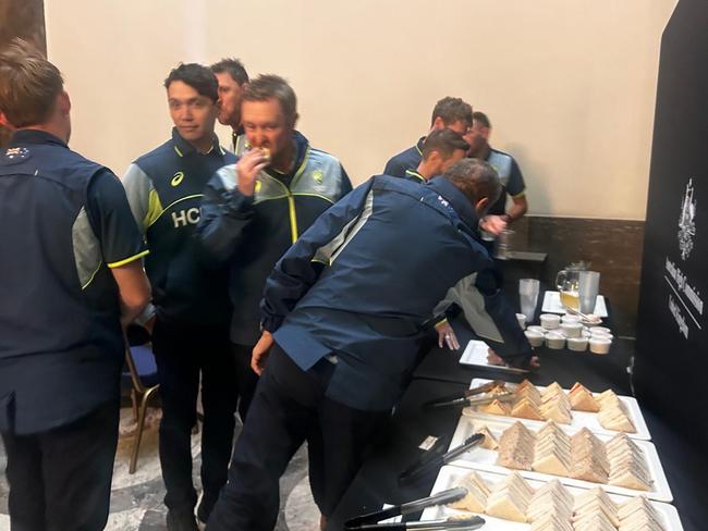 The Australian Men’s Cricket Team sample the food at Australia House in London. Picture: Sophie Elsworth