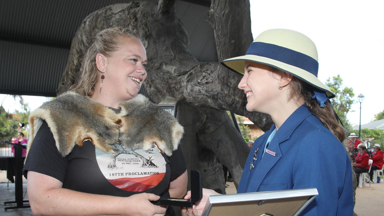 Kaurna woman, Quail Newchurch, speaks with 12 year old Georgia Griffin, who was a recipient of the Governor’s Civic Award. Picture Dean Martin