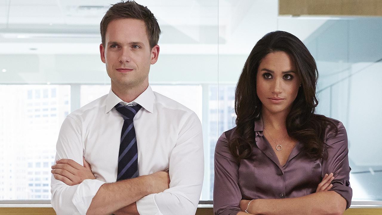 Meghan on the set of Suits with co-star Patrick J. Adams. Picture: Shane Mahood/USA Network