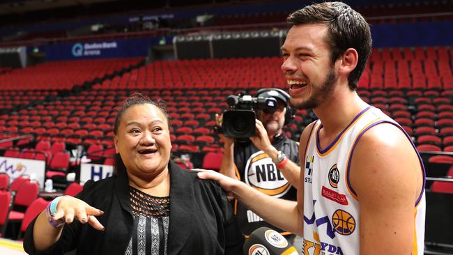 Sydney Kings Jason Cadee finally meets Ida Wetere who sang to and comforted him as he waited for paramedics after a near fatal car accident on the M7 in 2010. Picture: Brett Costello