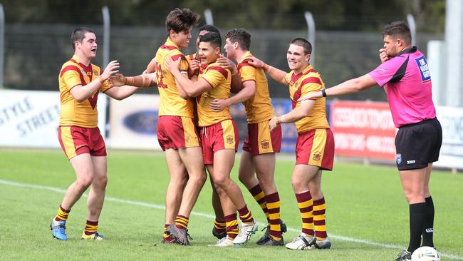 Holy Cross celebrate a try. Picture: Peter Lorimer