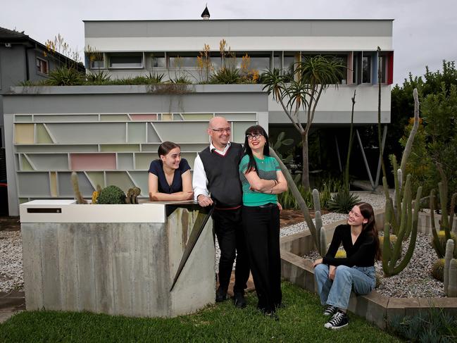 Warwick Noble and wife Melanie Hughes with daughters Lola 16 (R) and Evie 14 live in one of Grand Designs Australia's top 21 grandest houses at rated by celebrated architect Peter Maddison. Picture: Toby Zerna