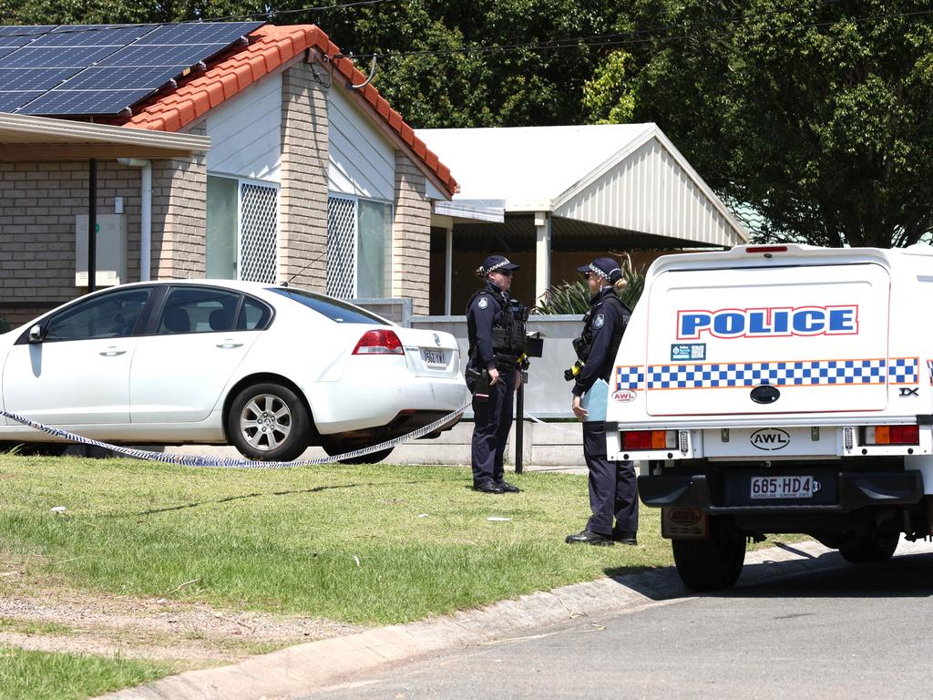 A dramatic police pursuit in which shots were fired at officers several times has led to a suburb south of Brisbane to be shut down on Friday night. Police pictured at Bix Court, Crestmead were the man was shot by police Picture David Clark